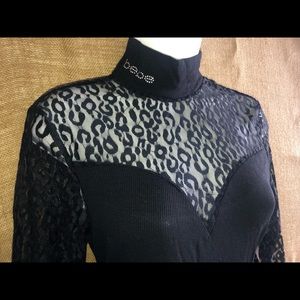 BeBe body suit with lace sleeves